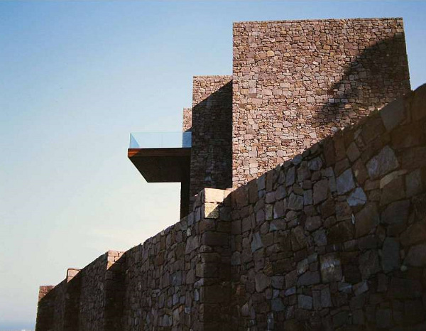 Home With Infinity Pool Exterior  walls Stone