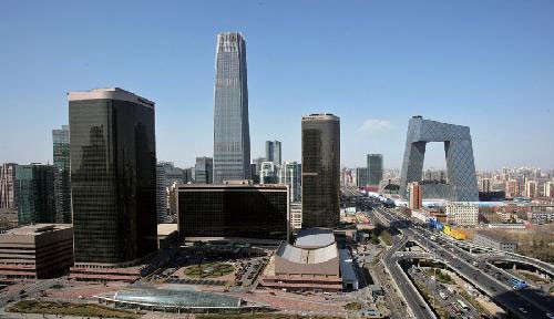 国贸大厦将与国贸一期、二期一起,成为全球最大的国际贸易中心。